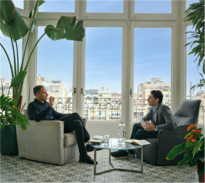A coaching conversation in a bright Barcelona apartment
